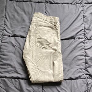Levi’s 514s white/cream corduroy pants, waist size 34, more like 32, length 30.
